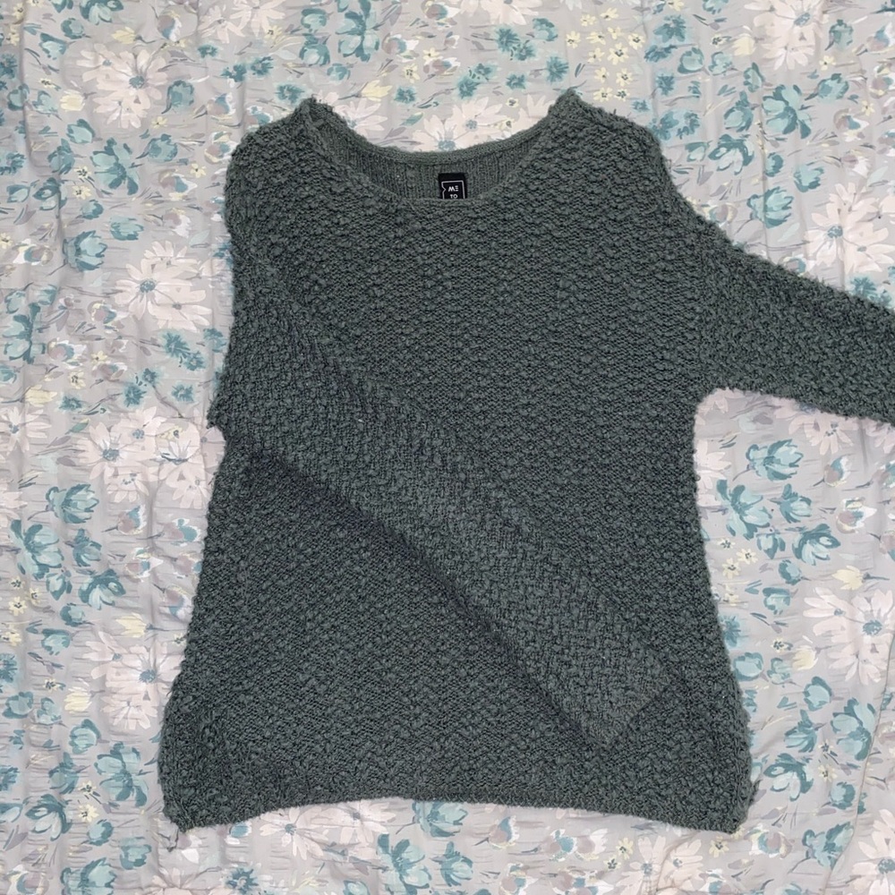 green knitted sweater